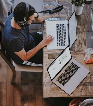 open laptop on wooden table